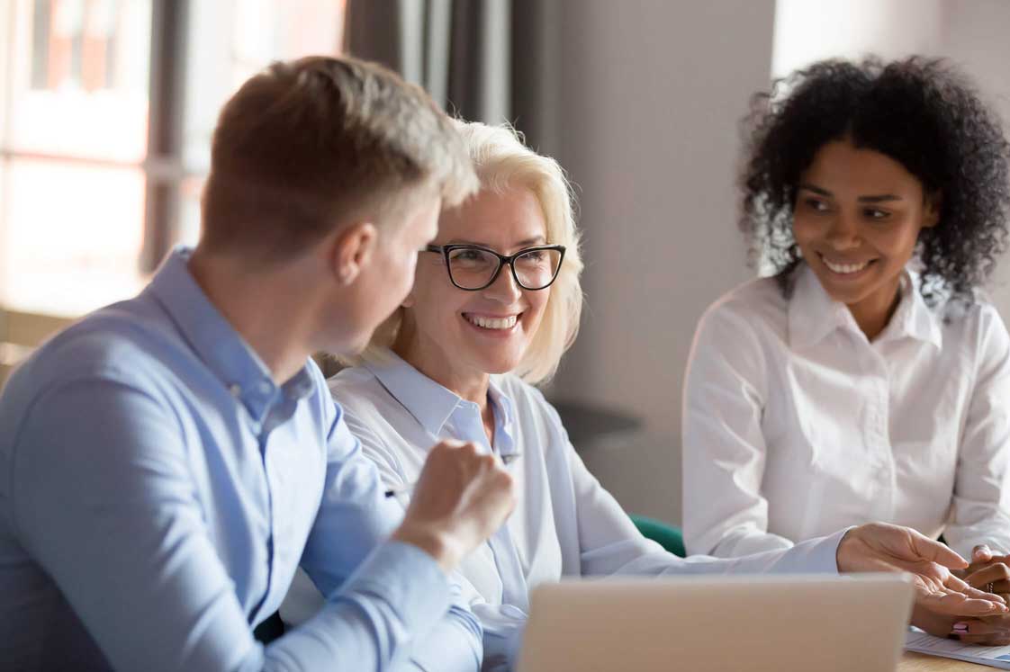 Three People Collaborating