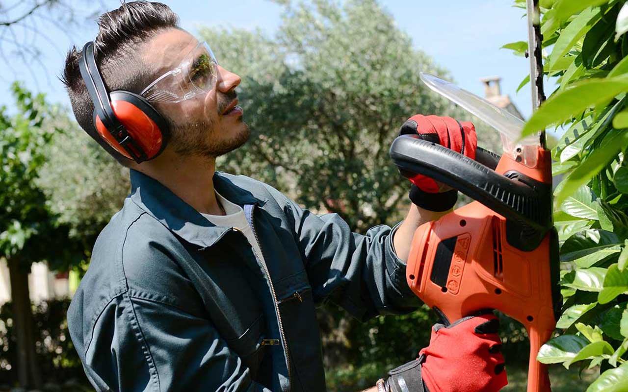 Service-based worker doing landscaping work