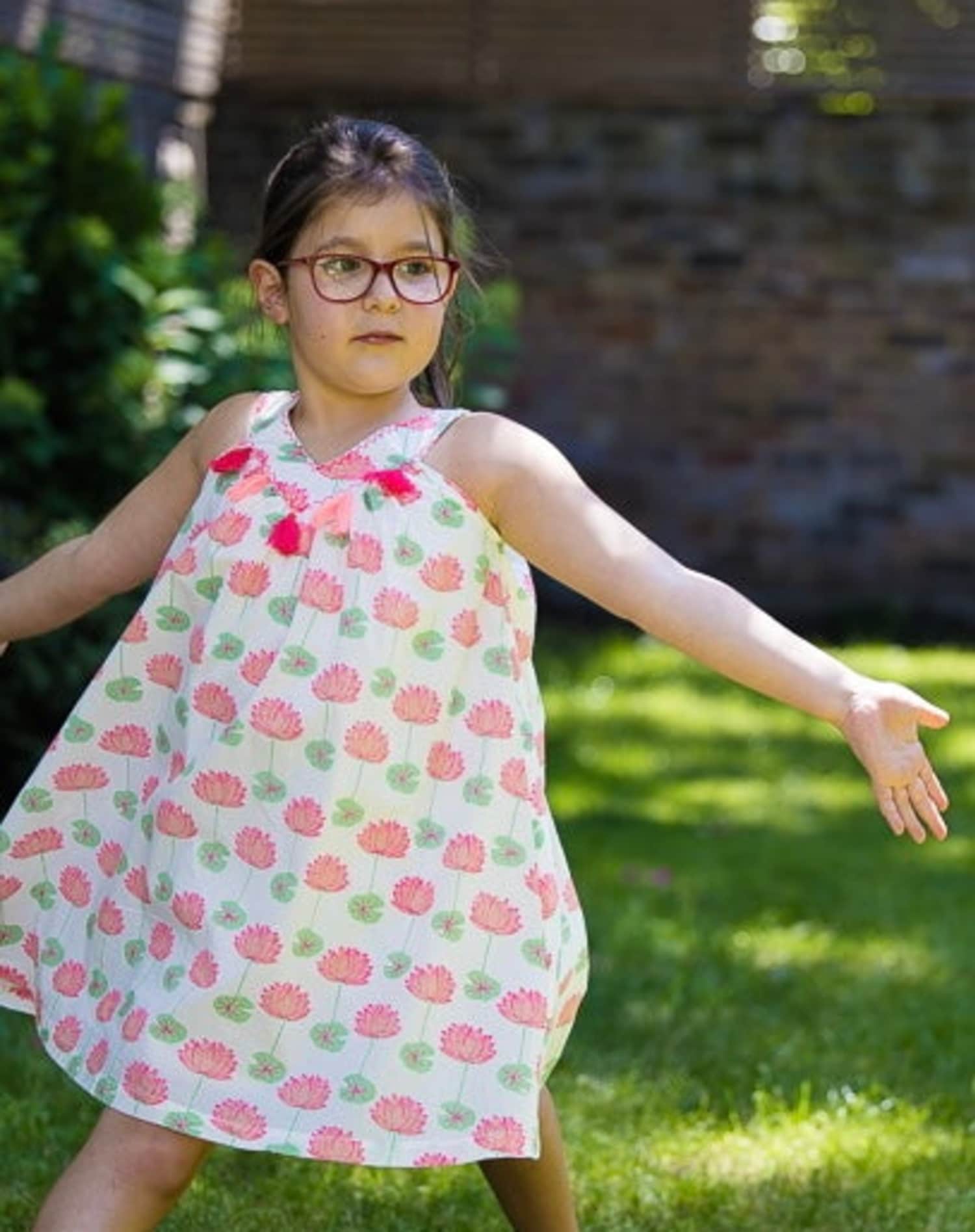 The Almirah Kids Cotton Dress in Pink Lotus Print