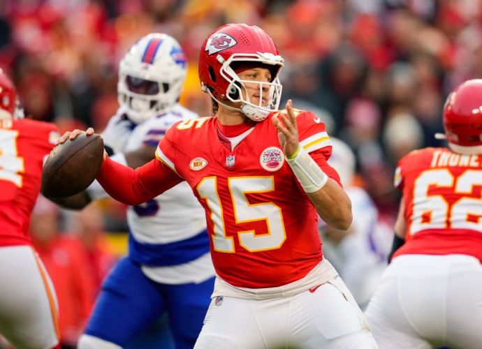 Kansas City Chiefs quarterback Patrick Mahomes preparing to throw a pass.