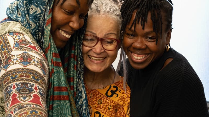 Imani Uzuri (Composer & Vocal Soundscapes), actor Lizan Mitchell, and actor Ngozi Anyanwu take a selfie together during rehearsal