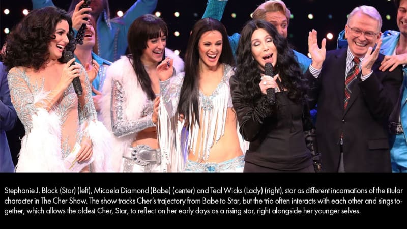 Cher sings on stage with the cast of THE CHER CHOW, which tracks Cher's trajectory from Babe to Star. The three different incarnations of her interact with each other during the show.