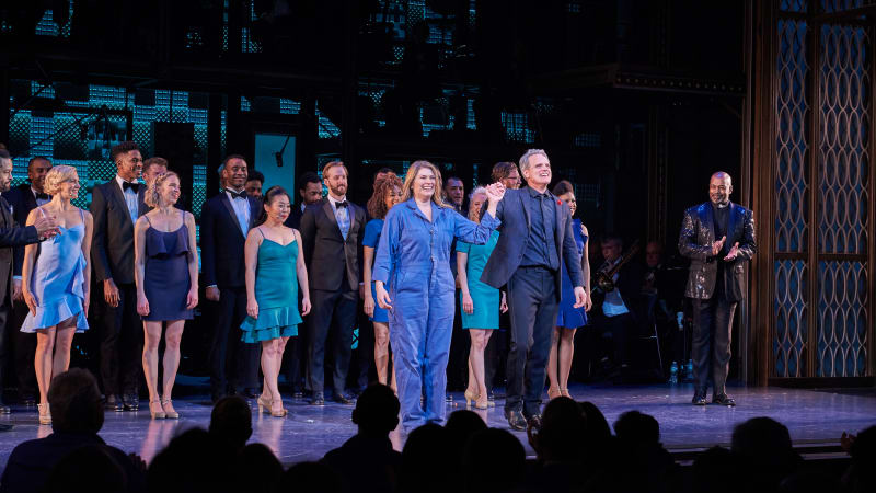 The cast of MY ONE AND ONLY at curtain call. A man and woman take their bow holding hands.