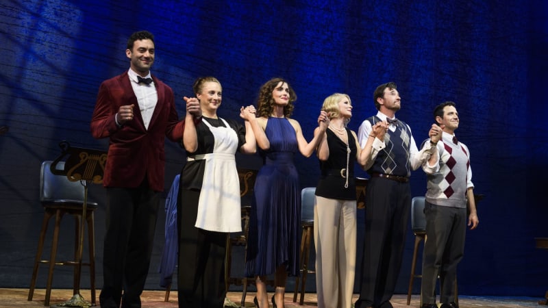 The Cast of Fallen Angels bowing on stage. 