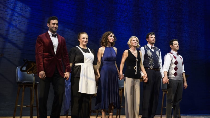 The Cast of Fallen Angels bowing on stage. 