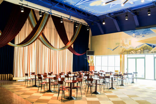 Todd Haimes Theatre Penthouse Lobby with tables and chairs. 