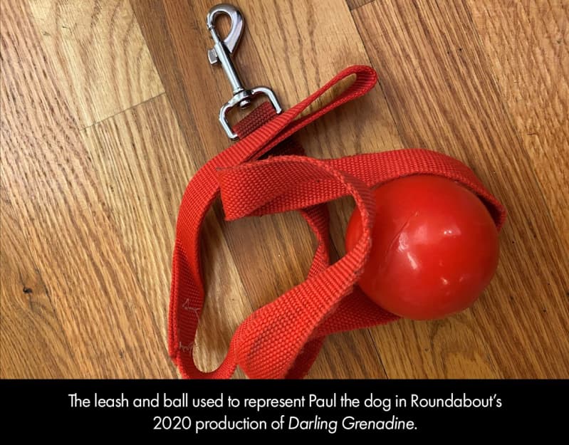 The red dog leash and ball used to represent Paul the dog in Roundabout's 2020 production of DARLING GRENADINE. 