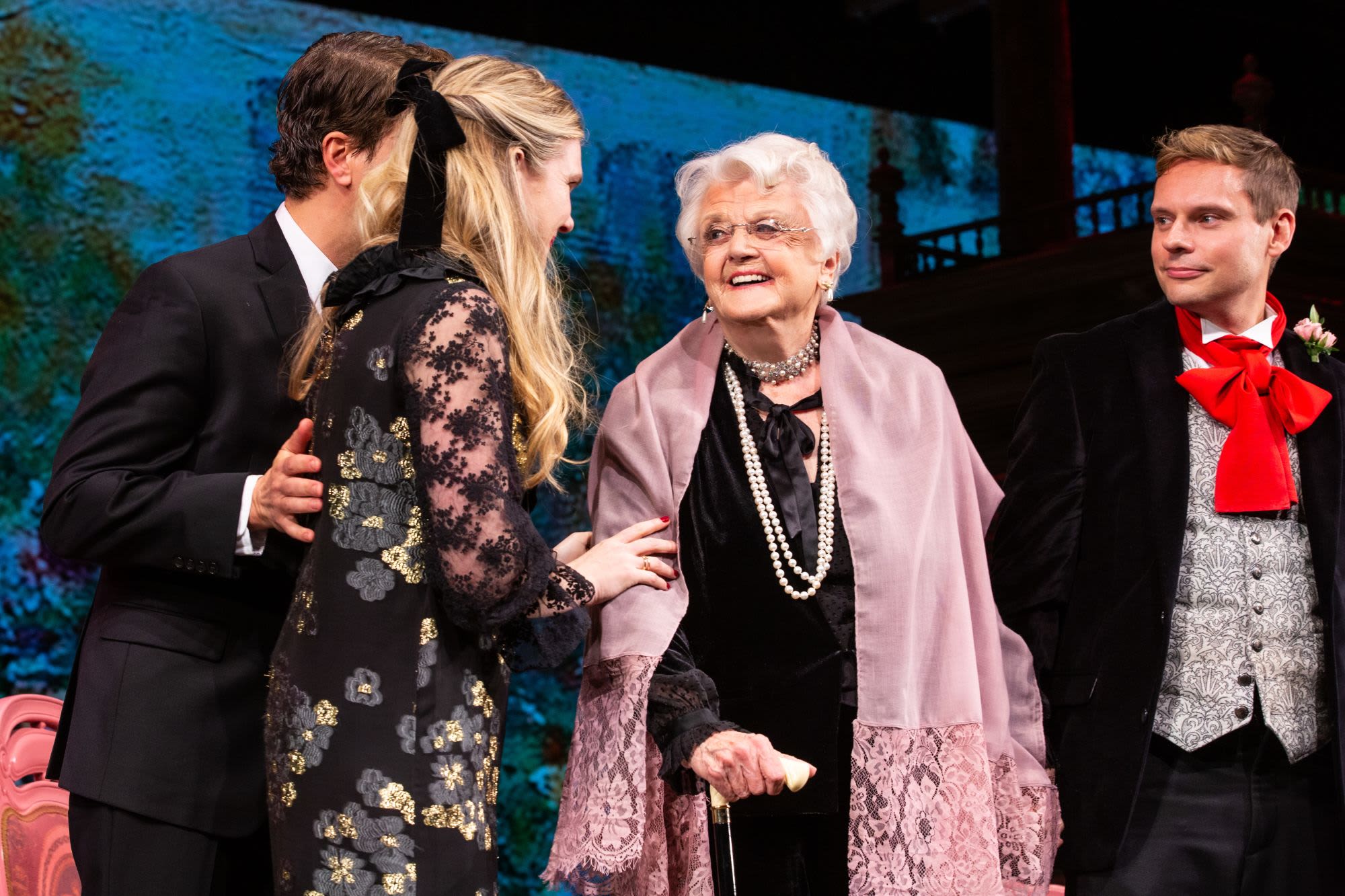 THE IMPORTANCE OF BEING EARNEST cast smiles and chats on stage after the curtain call. Photo by Evan Zimmerman.