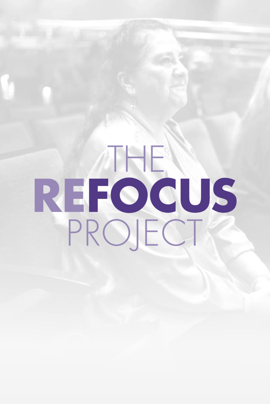 The Refocus Project: a woman smiles and looks upward while seated in a theatre auditorium, overlaid with the program title in purple typography.
