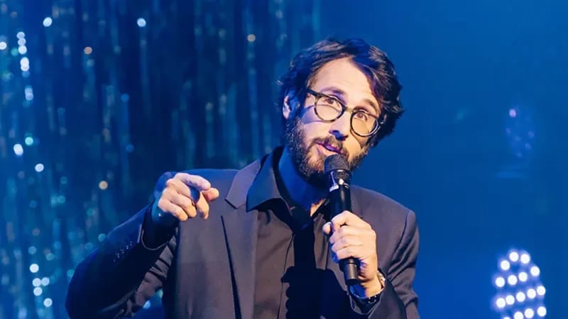 Josh Groban performing.  