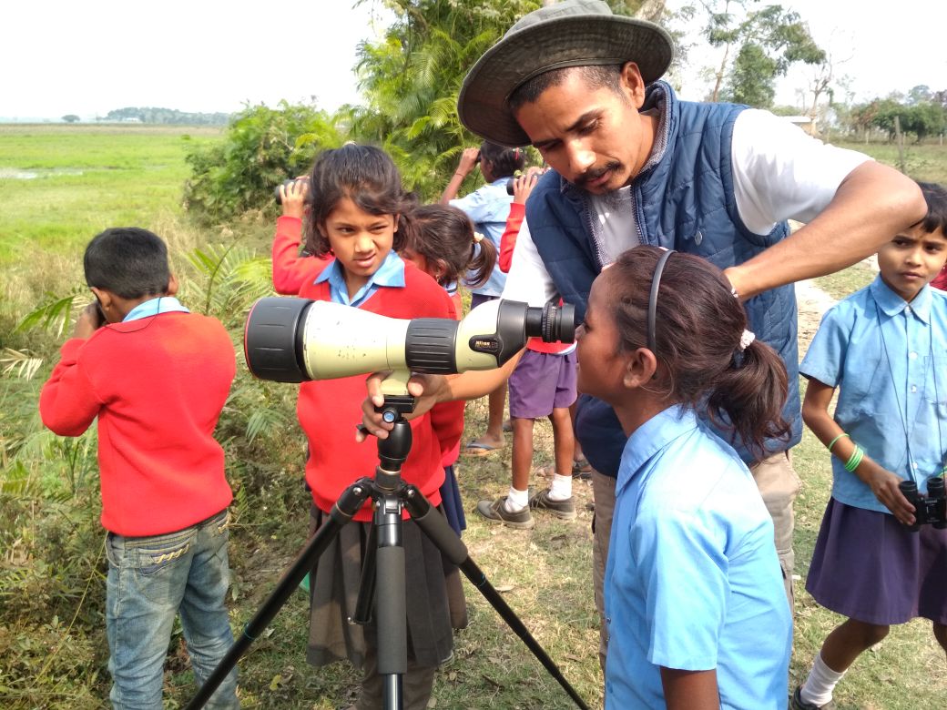Community awareness and sensitisation is crucial to wildlife conservation efforts. Manoj regularly leads children from the community on nature trails and introduces them to the wonders of nature.
Photo Courtesy: Manoj Gogoi 
