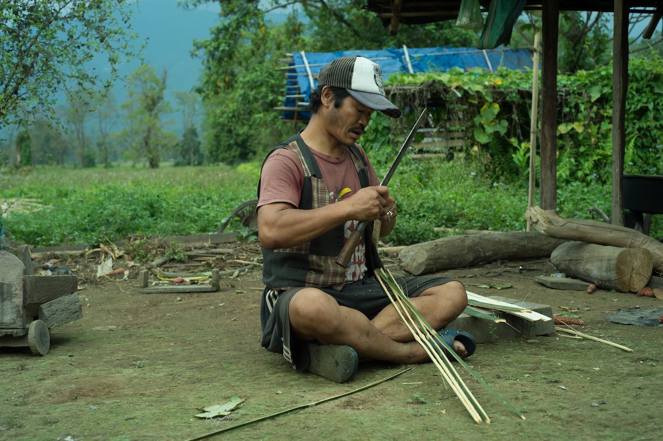 Eketo Mendo, an Idu-Mishimi subsistence farmer in Abango, a village bordering Mehao Wildlife Sanctuary in Lower Dibang Valley district of Arunachal Pradesh, has left a forested patch of his farm uncultivated so that a family of eastern hoolock gibbons can continue to live there. Photo: Prakash Bhuyan