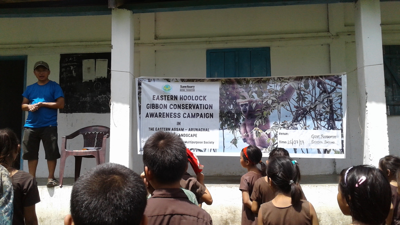 Abralow Memorial Multipurpose Society, a non-profit based in Roing, Lower Dibang Valley, led by Anoko Mega organizes eastern hoolock gibbon conservation awareness programs in the Mehao area. This photograph is from one such awareness program held at a government school in Injono village. Photo from Anoko Mega