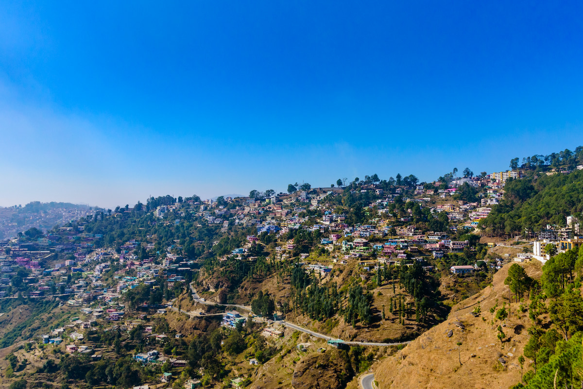 The crowded urban landscape of Almora, Uttarakhand. Growing urban settlements negatively affect oak forest health in the Himalayas as stream water are diverted from forests, there is an increased dependency on fuel wood, and curtailment of surface water flow. Photo: Amit kg/Shutterstock