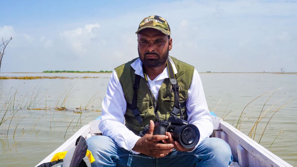 Birdman and boatman of Nal Sarovar