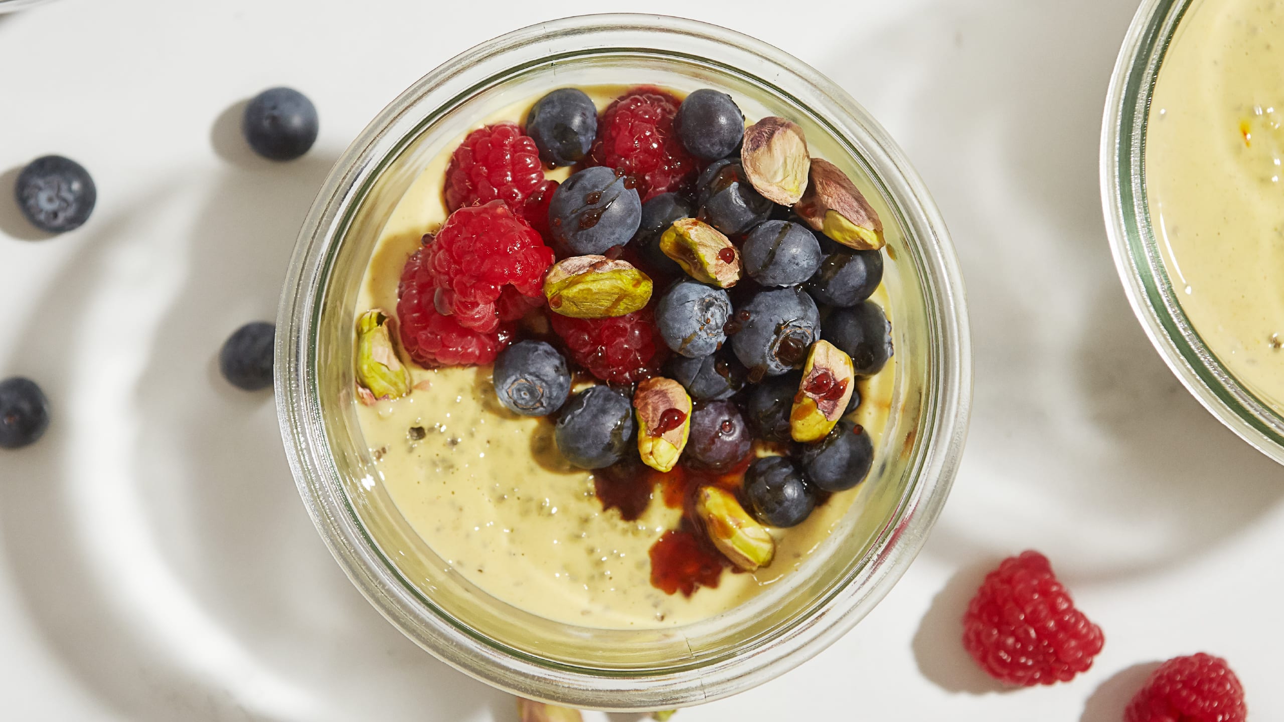 Chia pudding with berries in glass jar sketch Vector Image