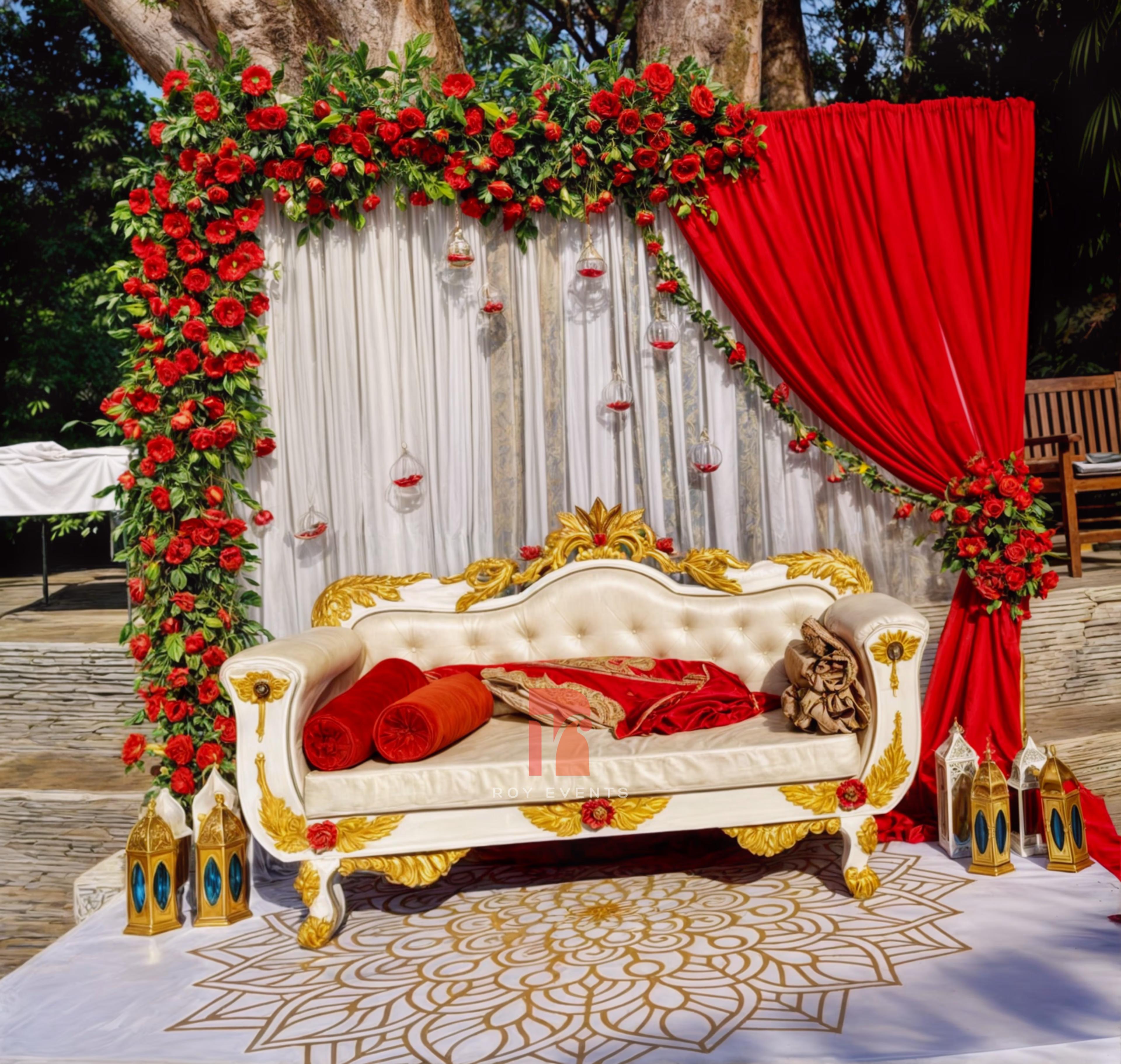 Elegant Outdoor Wedding Backdrop with Floral and Fabric Accents