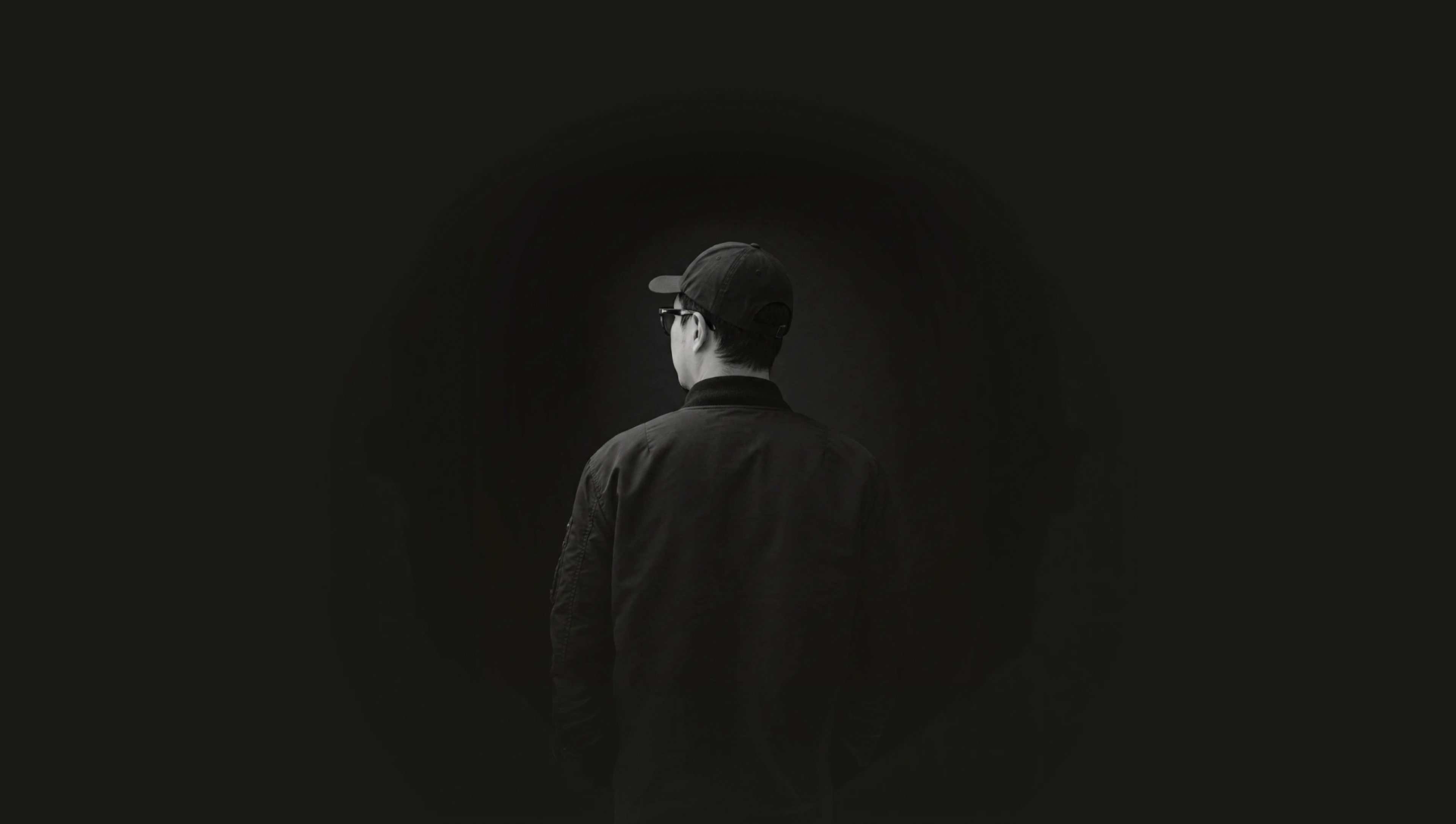 Soong Shin, standing in profile