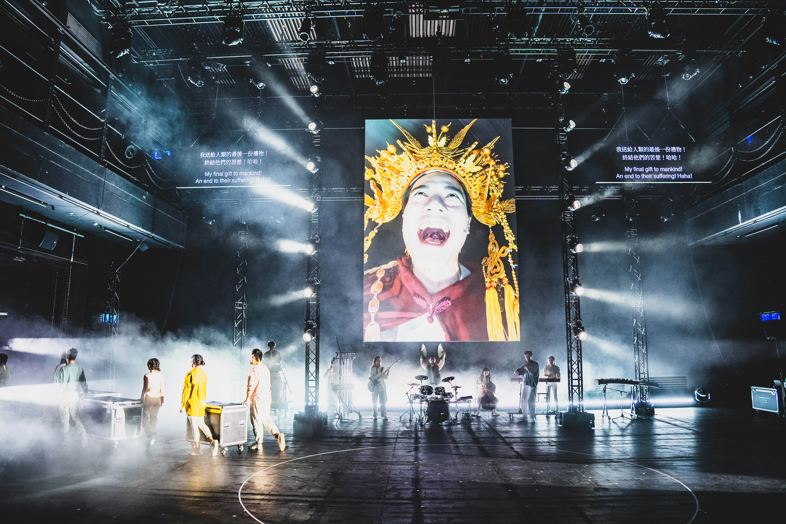 The ensemble confronts the haunting descent into madness, where the performer embodying the divine declares: 'My final gift is madness! An end to their suffering! Haha!' during our WestK production.