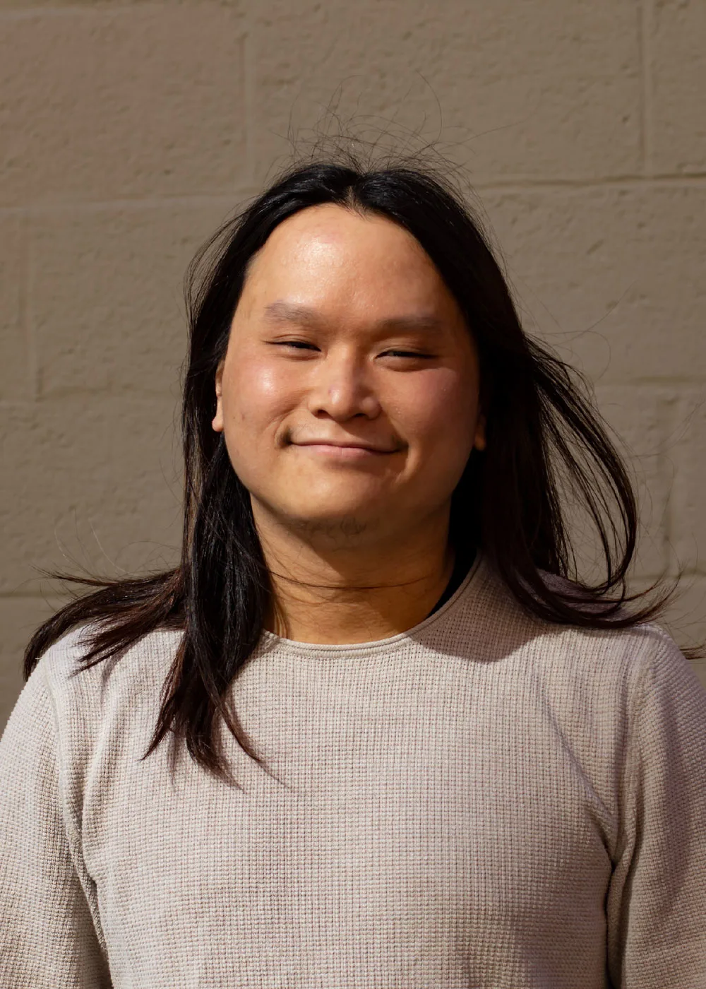 A headshot of Samuel Chan