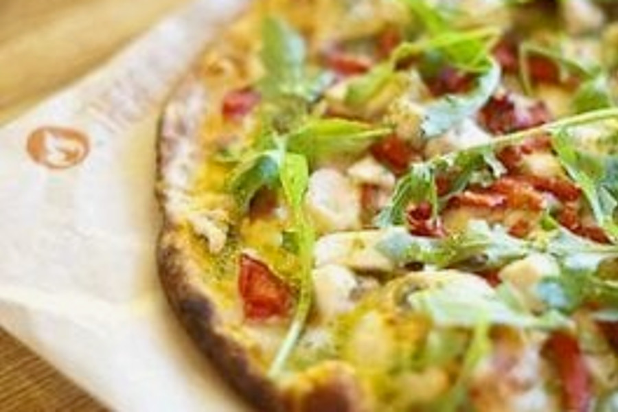 Pizza From Blaze Fast-Fire'd Pizza On Table
