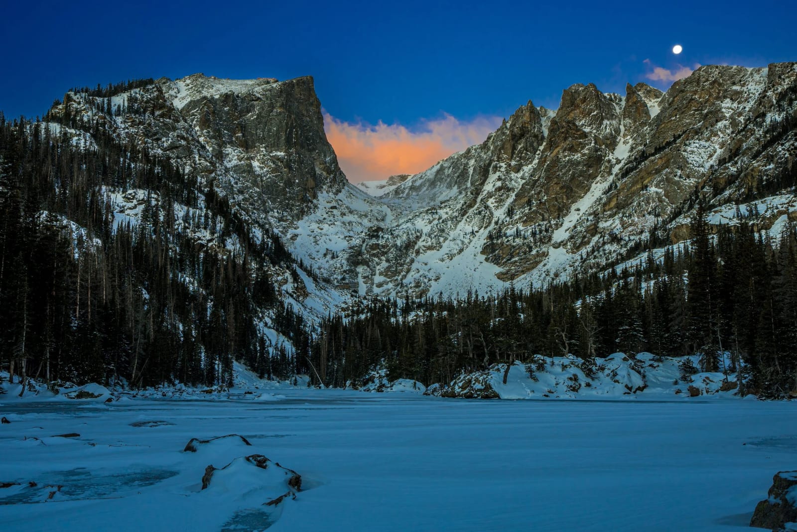 One Cloud Caught Fire — Rocky Mountain National Park, Colorado. One cloud caught fire in the notch above Dream Lake while the moon hung around to watch, the…