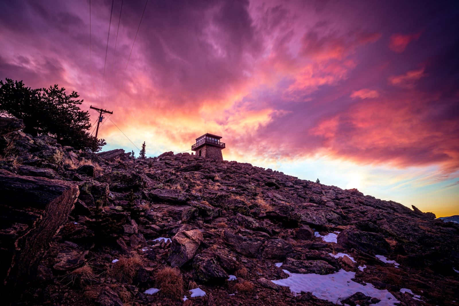 Purple Hour on the Summit — Mestaa'ehehe Mountain, Colorado. Purple hour on a Colorado summit with the fire lookout holding the high ground and the whole…