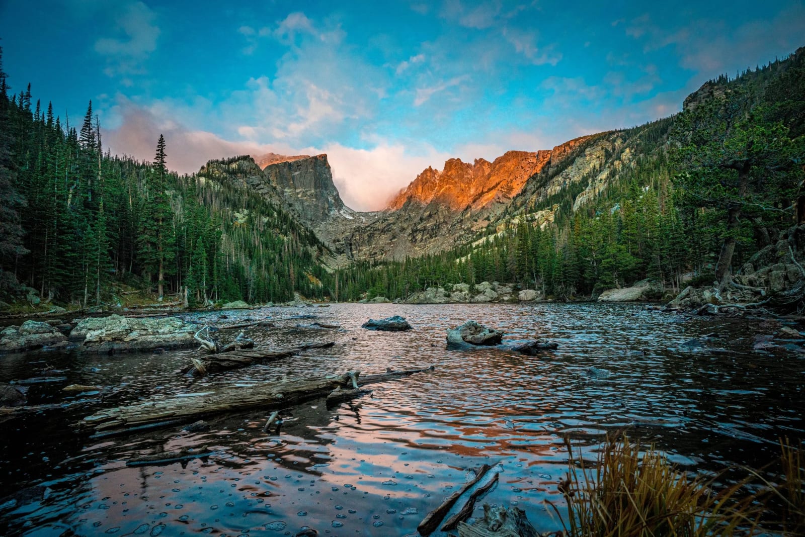 Five Minutes, Then an Ordinary Day — Dream Lake, Rocky Mountain National Park, Colorado. Alpenglow burning along the ridge above Dream Lake in Rocky…