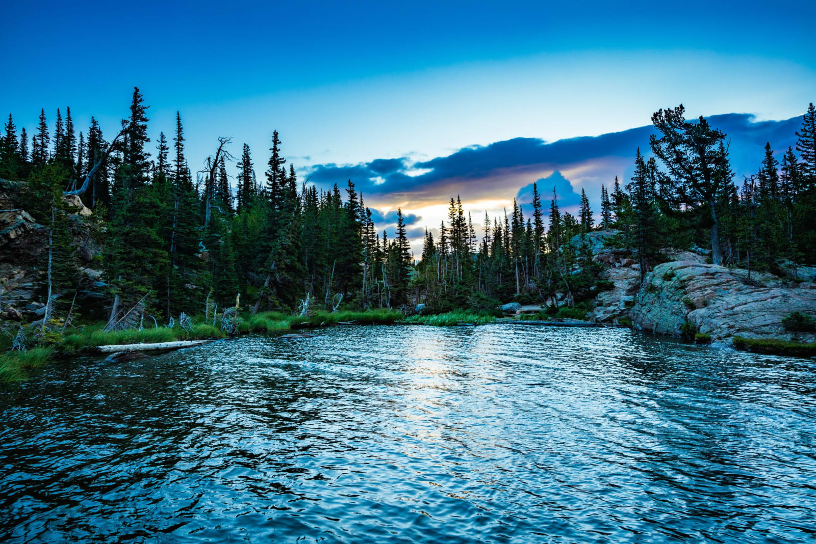 The Moon Clocks In — Rocky Mountain National Park, Colorado. The moon punching in for its shift over a mountain lake just as the day's blue drained out of…
