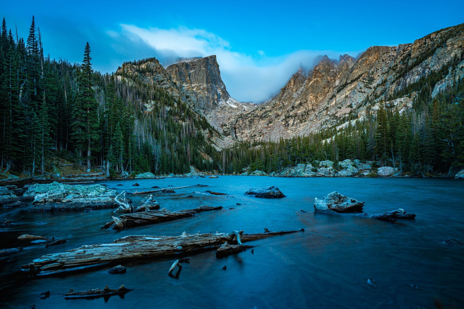 Blue Hour Holds On — Rocky Mountain National Park, Colorado. Blue hour holding on at Dream Lake in Rocky Mountain National Park while a neutral density…