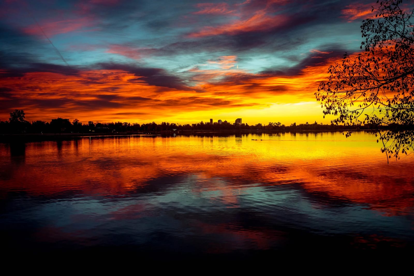 Sloan's Lake on Fire — Sloan's Lake, Denver. The entire sky caught fire over Sloan's Lake in Denver and the water threw every bit of it right back.