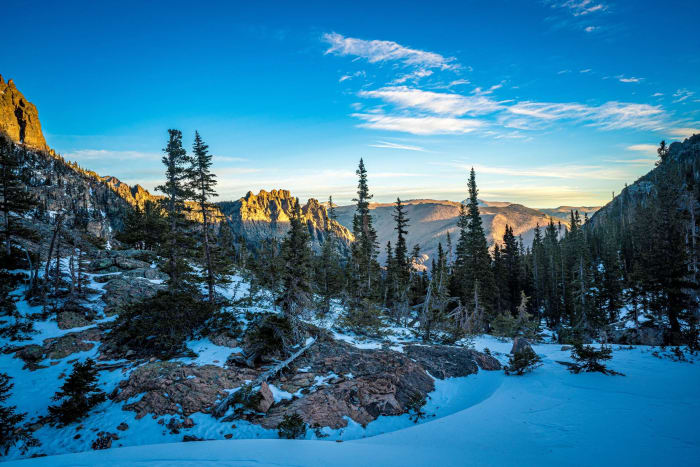 Better Than Most Places — Rocky Mountain National Park, Colorado. Granite, snow-dusted pines, and a sky with nothing to prove in Rocky Mountain National Park.