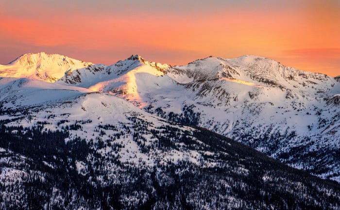 Alpenglow Like a Fuse — Loveland Pass, Colorado. Alpenglow running the full length of a snow-loaded ridge like a lit fuse while the valleys below stay dark…