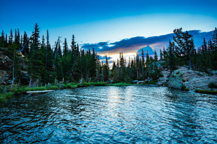 The Moon Clocks In — Rocky Mountain National Park, Colorado. The moon punching in for its shift over a mountain lake just as the day's blue drained out of…