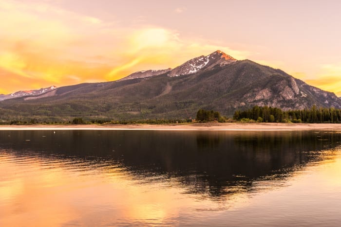 Peak One in Gold Water — Lake Dillon, Colorado. Sunset on Lake Dillon with the Tenmile Range catching the last light and the whole surface of the reservoir…