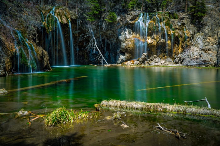 Emerald Pool, Many Falls — Hanging Lake, Glenwood Canyon, Colorado. A long exposure across Hanging Lake in Glenwood Canyon, Colorado, with the falls pouring…