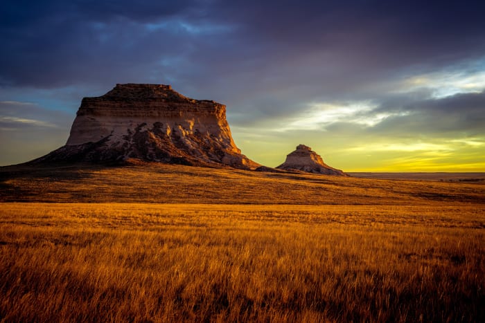 Golden Grass at Pawnee Buttes — Pawnee National Grassland, Colorado. Low winter sun lighting the larger of the two Pawnee Buttes and the golden prairie…