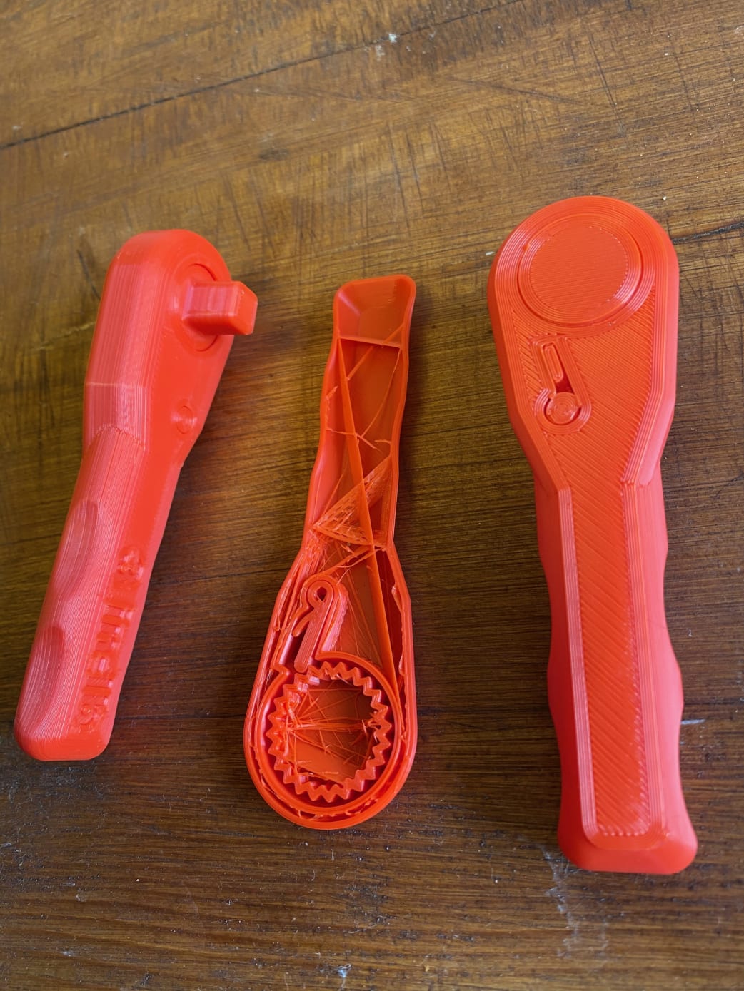 Finished 3D printed wrench along side internal construction