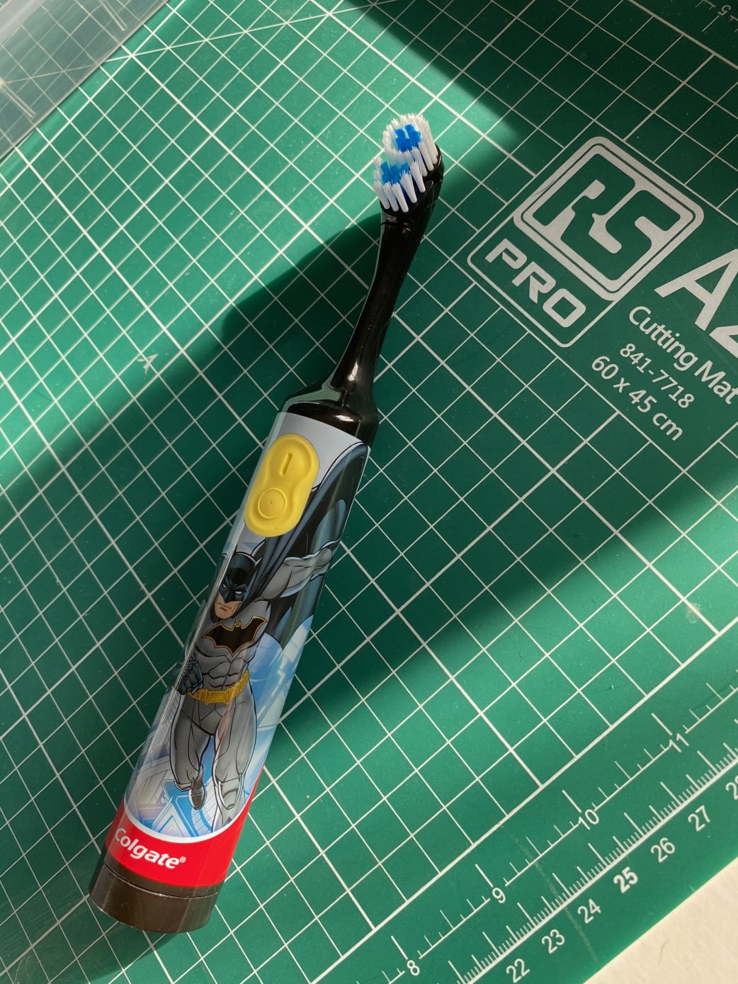 A toothbrush used as an agitator to improve flow from the bag