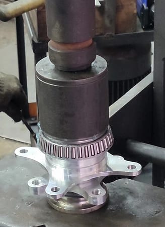 hub pressed into upright