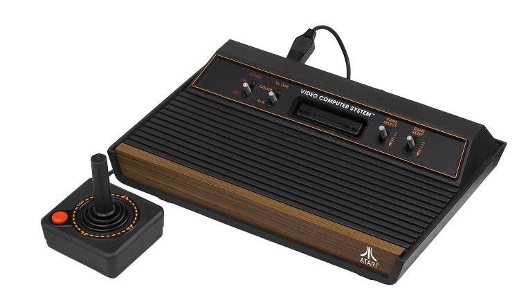 Atari-2600-Wood_750px_4aaca83f0aa033ef70e7f00e1fec63bc98f35b70.jpg