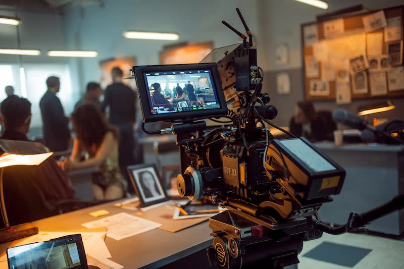 Image of a camera behind a film set