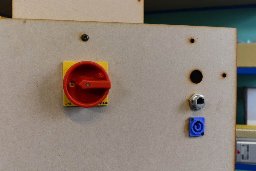 Rotary isolator on back panel