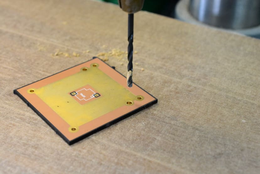 Six holes in the detector assembly PCB had to be drilled out to 2mm