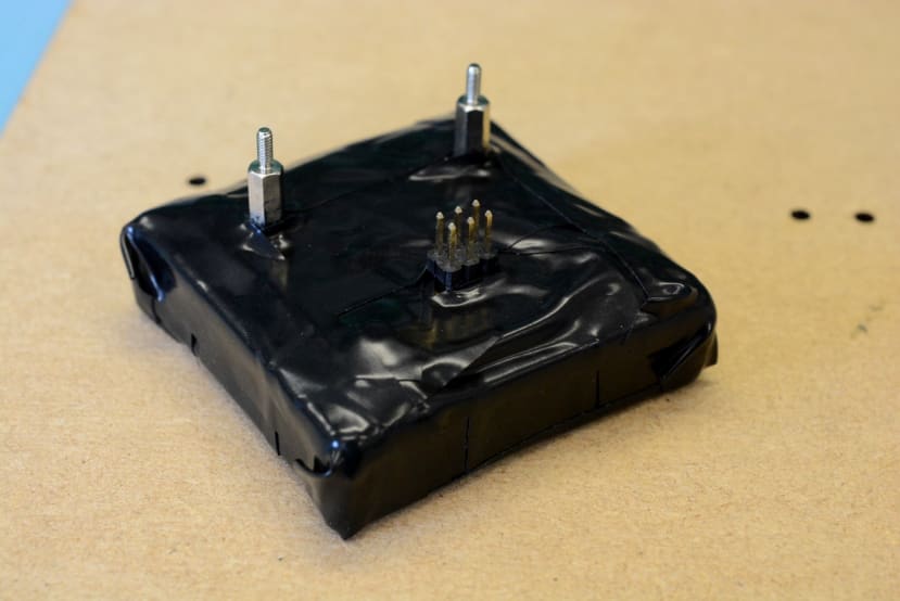 The detector was now wrapped in more tape to keep light out