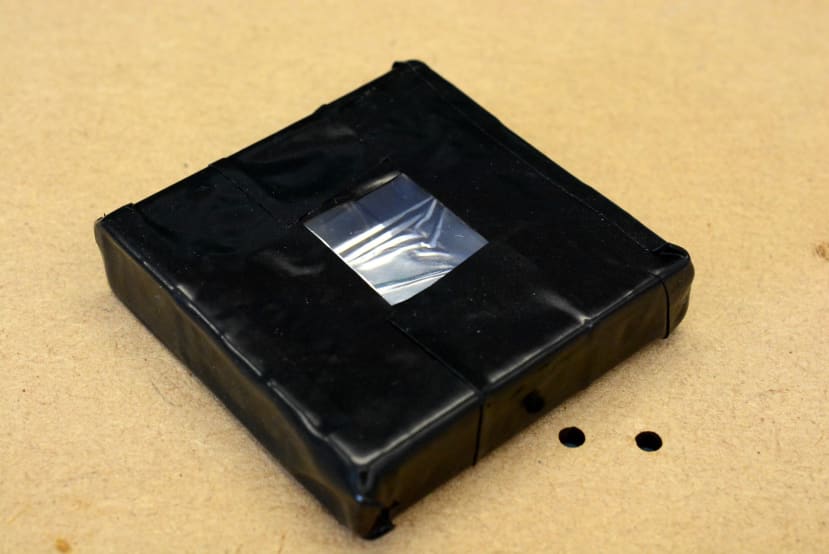 The scintillator was then wrapped in tape to block external light sources