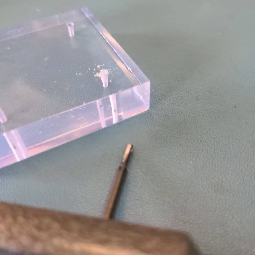 Next the holes were tapped to an M2 thread