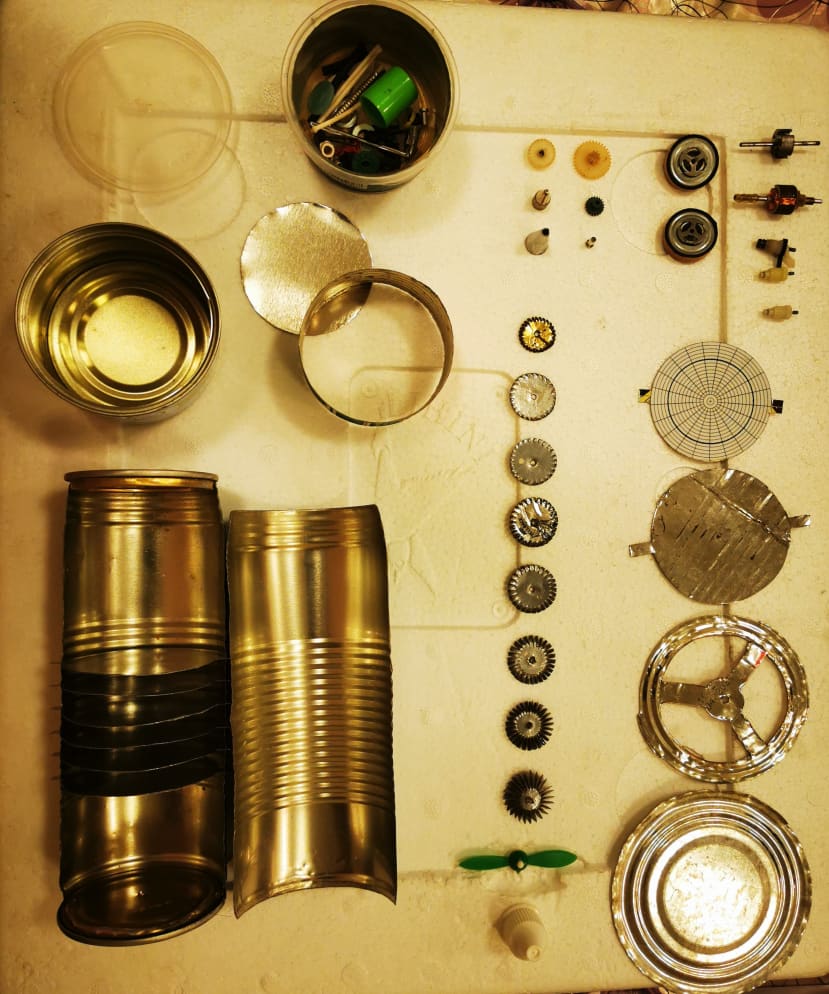 Fig 2: Summary of prototyped components, including blades from an initial compressor which were far too small (middle column) compared to the current housing and uncut blades (left and right columns)