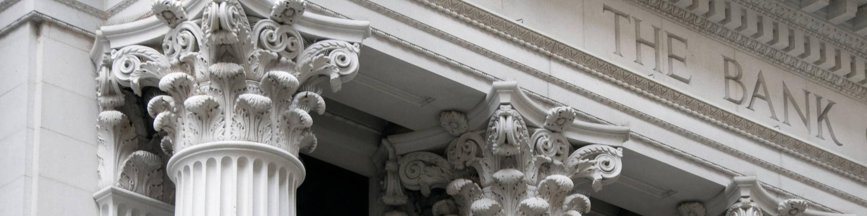 marble columns on the facade of a bank