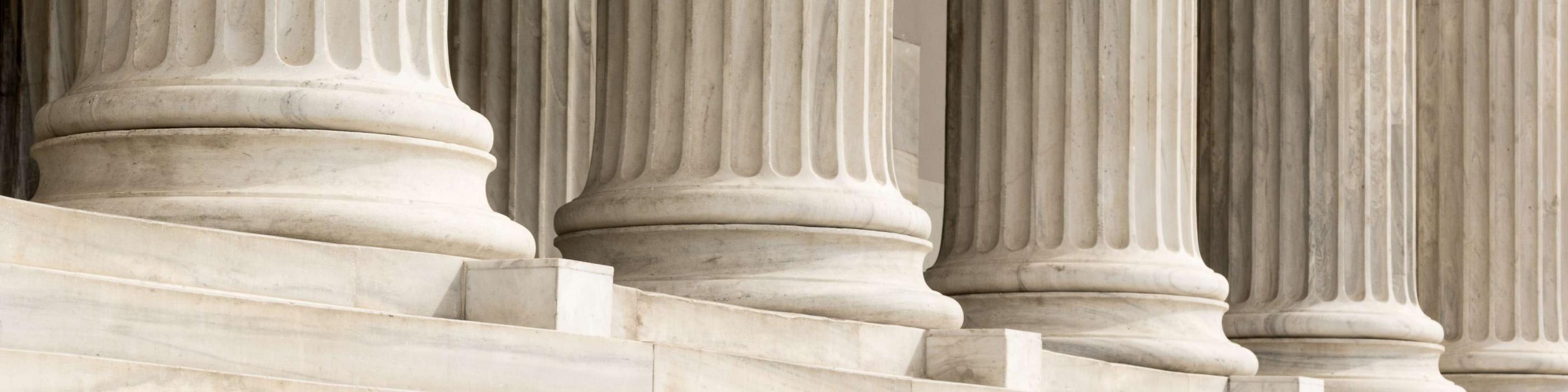 Neoclassical building with tall columns and wide steps